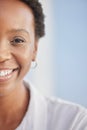 Half, face and happy black woman with mockup, smile and happiness on blue background in Nigeria. Split portrait of young Royalty Free Stock Photo