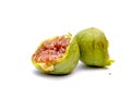 half fig, macro shot  on white background shows the juicy red fruit pulp with the seeds Royalty Free Stock Photo