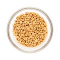 Half filled bowl of Organic Fenugreek.