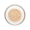 Half filled bowl of Organic White Poppy seed. Royalty Free Stock Photo