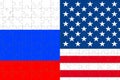 Half flags of united states of america and half russian flag on