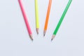Four colorful Pencil point to something on White Background Royalty Free Stock Photo