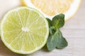 Half fresh lime in the wooden background. Royalty Free Stock Photo