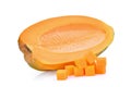 Half of fresh papaya seedless with cubes on white Royalty Free Stock Photo