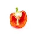 A half of fresh red bell pepper is on a white background Royalty Free Stock Photo