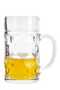 Half full glass beer tankard on a white background Royalty Free Stock Photo