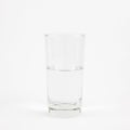 Half full glass of pure mineral water Royalty Free Stock Photo