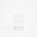 Half full glass of pure mineral water Royalty Free Stock Photo