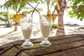 Half full glasses of tropical pina colada cocktail drink with pi Royalty Free Stock Photo