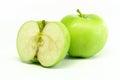 Half and full green apple Royalty Free Stock Photo