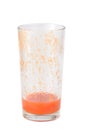 Half full tomato juice glass isolated on white Royalty Free Stock Photo