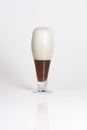 Half of glass of cold dark beer Royalty Free Stock Photo