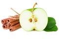 half of green apple with green leaves and cinnamon isolated on white background Royalty Free Stock Photo