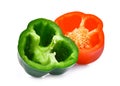 Half of green and red sweet bell pepper or capsicum isolated Royalty Free Stock Photo