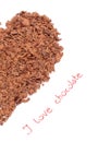 Half of heart from grated chocolate on white background Royalty Free Stock Photo