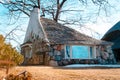 A view of the Half House, an Earl Young Mushroom House in Charlevoix Michigan