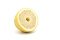 Half Japanese lemon isolated on white background