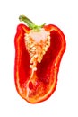 Half a juicy red bell pepper on black background Royalty Free Stock Photo