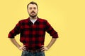 Half-length close up portrait of young man on yellow background. Royalty Free Stock Photo