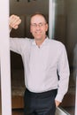 Half-length portrait of the handsome smiling groom. Royalty Free Stock Photo