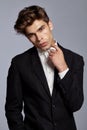 Half-length portrait of young handsome man in suit Royalty Free Stock Photo