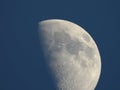 Half moon against blue sky Royalty Free Stock Photo