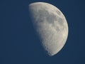 Half moon against blue sky Royalty Free Stock Photo