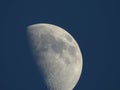 Half moon against blue sky Royalty Free Stock Photo