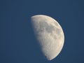 Half moon against blue sky Royalty Free Stock Photo