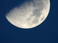 Half moon against blue sky Royalty Free Stock Photo