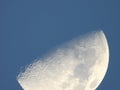 Half moon against blue sky Royalty Free Stock Photo