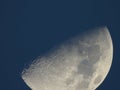 Half moon against blue sky Royalty Free Stock Photo