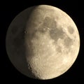 Half Moon with Craters. The Moon is an astronomical body that orbits planet Earth, being Earth`s only permanent natural satellite