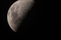 Half moon in a dark black sky Royalty Free Stock Photo