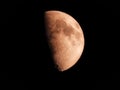 Half Moon First Quarter in Black Sky Royalty Free Stock Photo