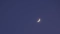 half moon floating on blue sky in twilight background Royalty Free Stock Photo