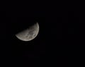 Half moon at night in dark sky Royalty Free Stock Photo