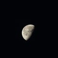 Half moon in the night sky. Royalty Free Stock Photo