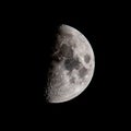 Half moon in the night sky in december