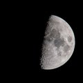 Half moon in the night sky in december