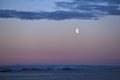 Moon over ice fields in the arctic sea