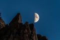 Half moon and rocky mountain in Provo Canyon against dark blue sky at night Royalty Free Stock Photo