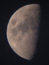 Half moon seen through a small telescope