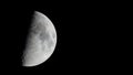 Half moon seen with telescope Royalty Free Stock Photo