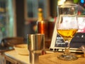 Almost half a mug of fresh beer placed on the wooden table Royalty Free Stock Photo