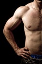 Half of muscular male body isolated on black Royalty Free Stock Photo