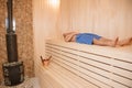 Handsome man relaxing in sauna and staying healthy Royalty Free Stock Photo