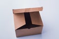 Half-opened empty cardboard carton box. Royalty Free Stock Photo