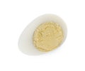 Half of peeled hard boiled quail egg on white background, top view Royalty Free Stock Photo