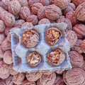 Half-peeled walnuts closeup